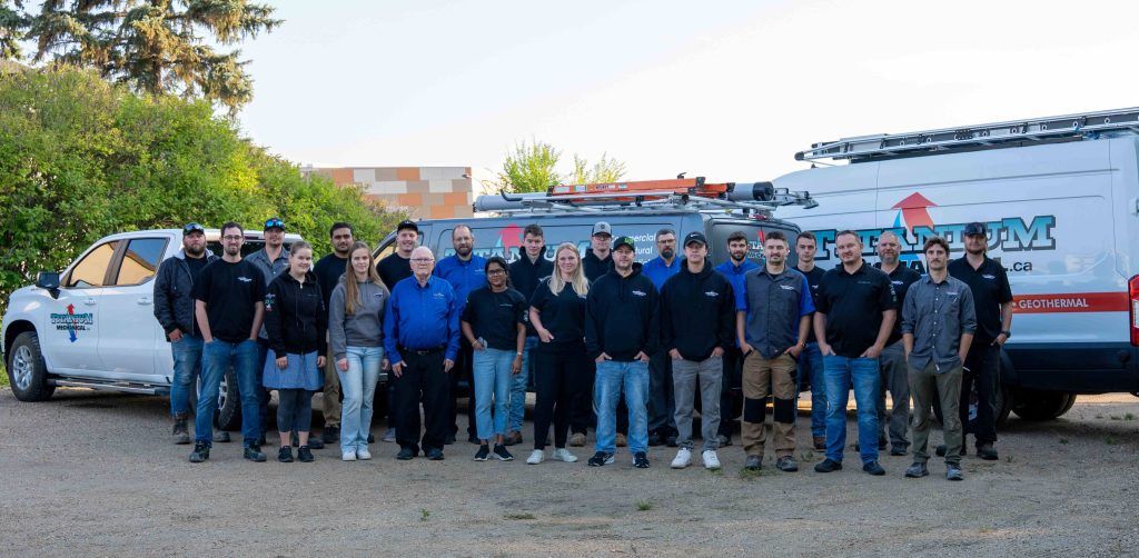 The Titanium Mechanical team standing in front of their service vans